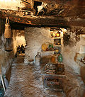 Interior de habitação de pedra
